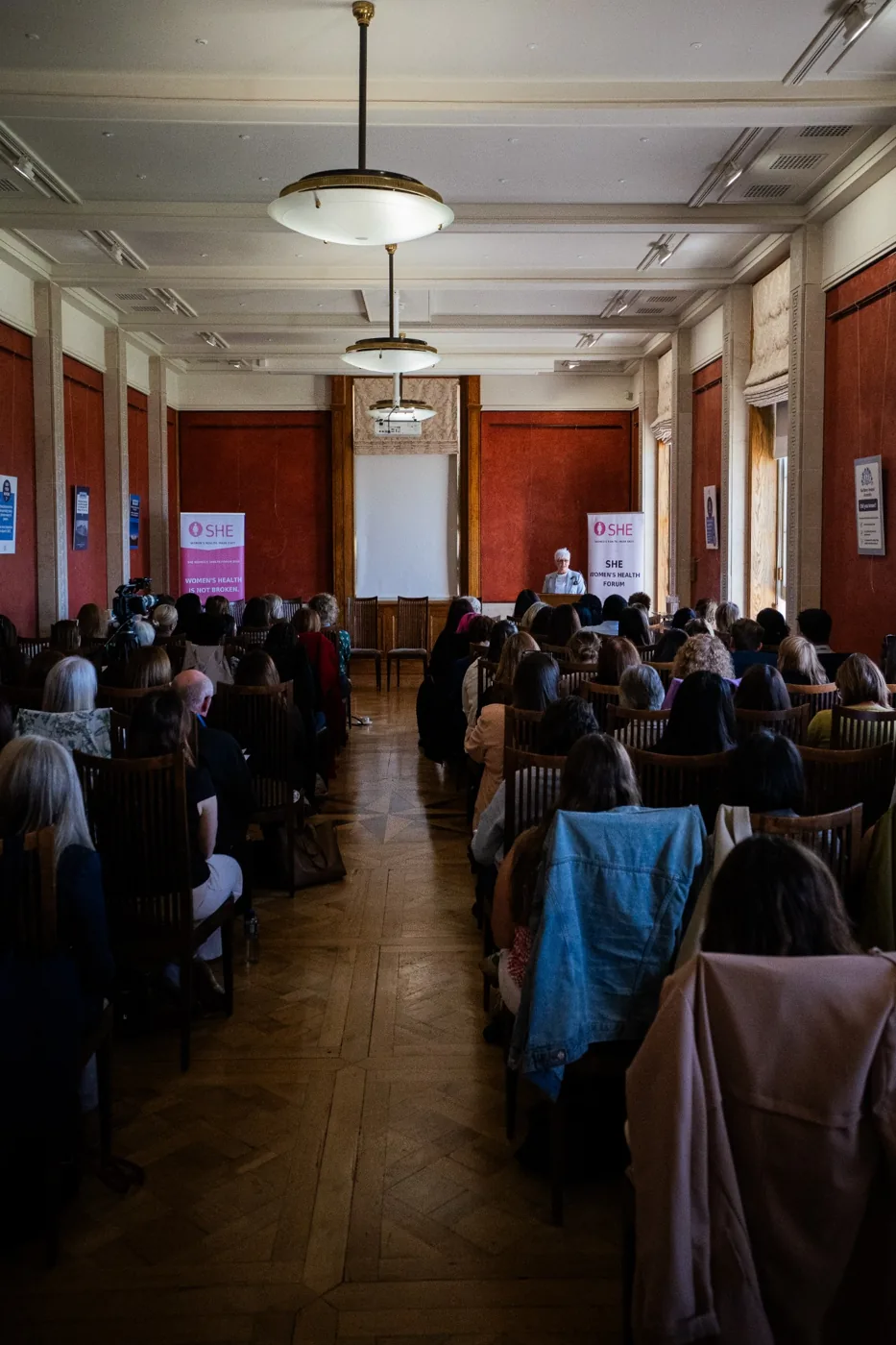 Audience listening to a speaker