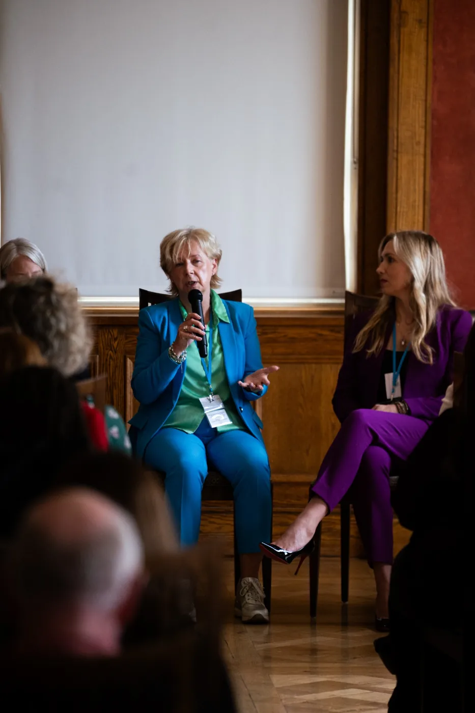 Two speakers in conversation on the Forum stage